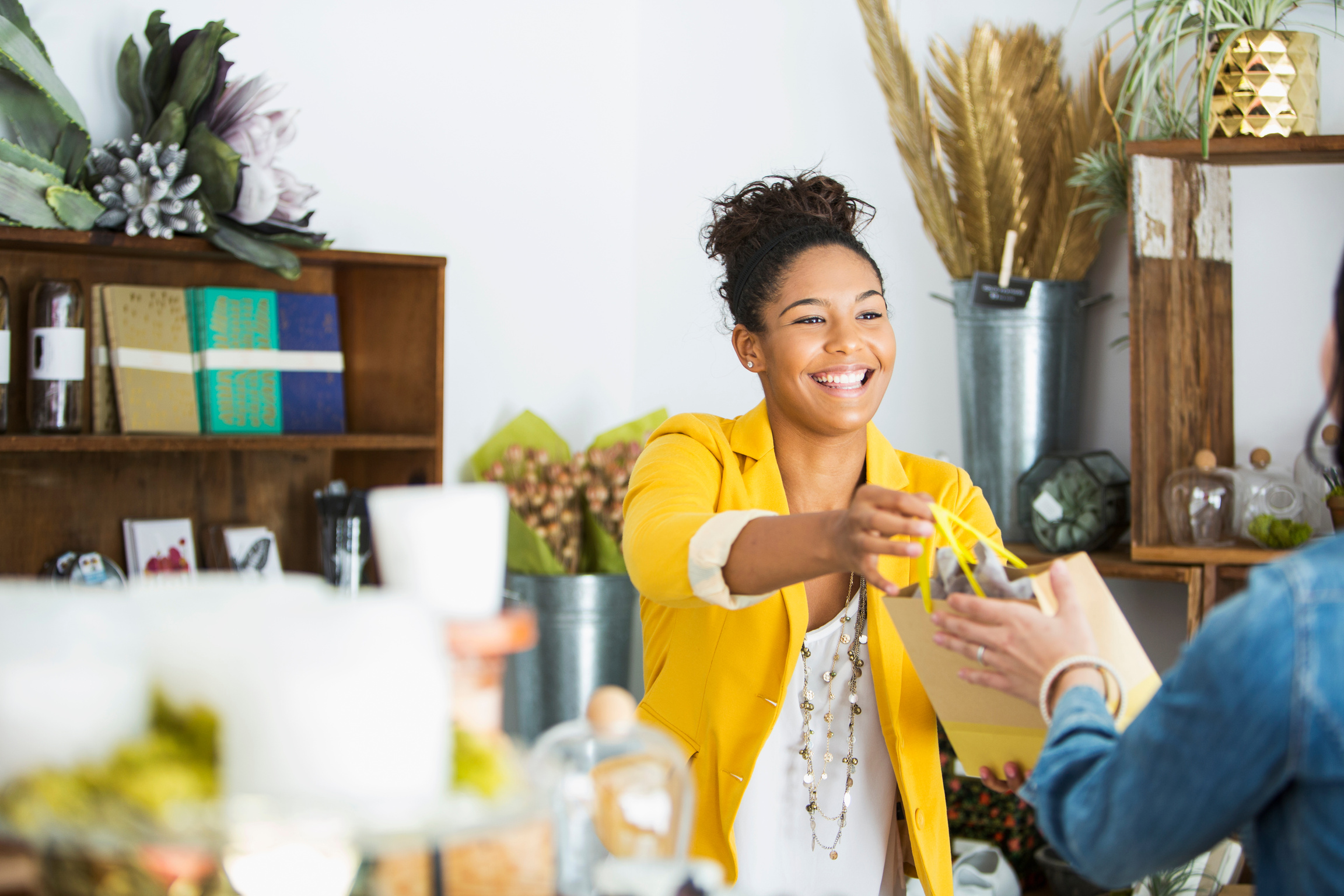 Saleswoman helping customer